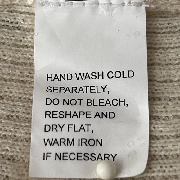 Cream Knit shrug with asymmetrical Open Front design. - Picture 4 of 6